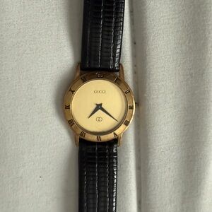 Gucci Men's Watch with Gold Dial and Black Strap